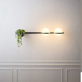 Modern Black Wall Light with Green Plants